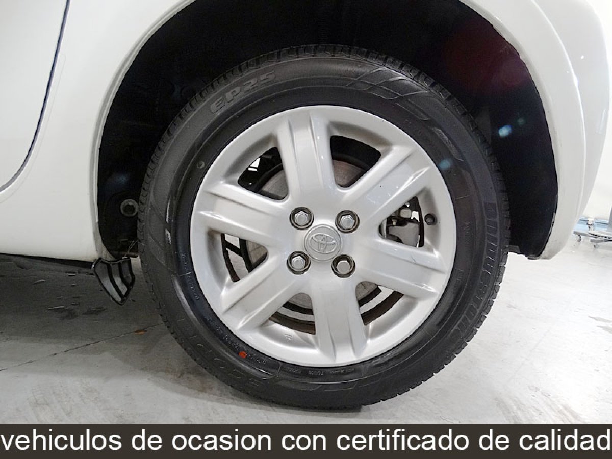 Foto Toyota iQ 10